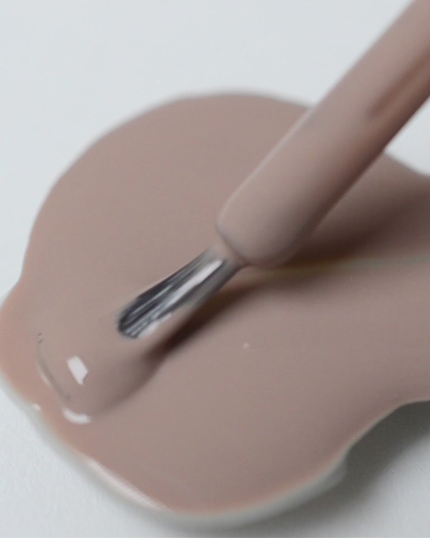 beige nail polish drop by sienna