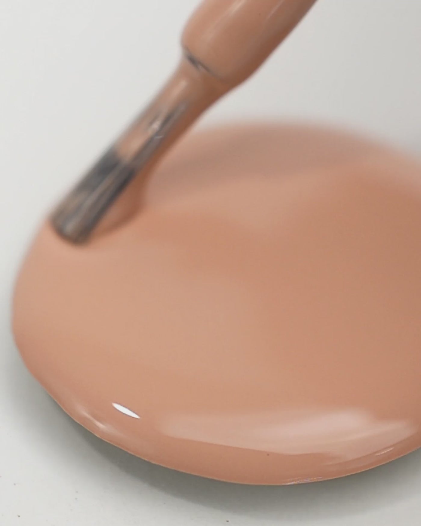 Nude beige nail polish drop by sienna
