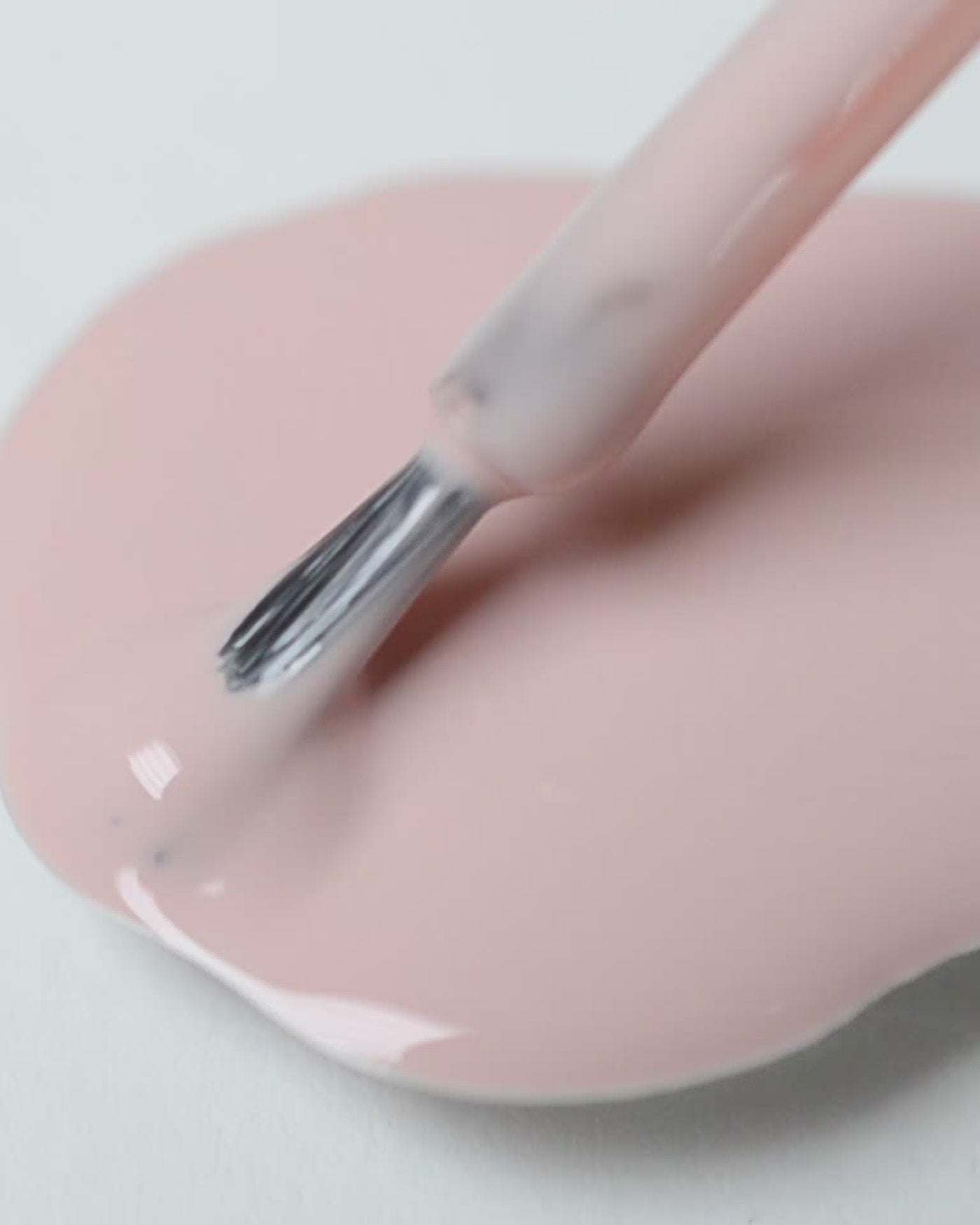 Light champagne pink nail polish drop by sienna