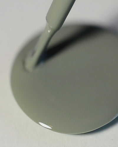 A nail polish swirl of Soundscape sage green crème by Sienna Byron Bay close-up.