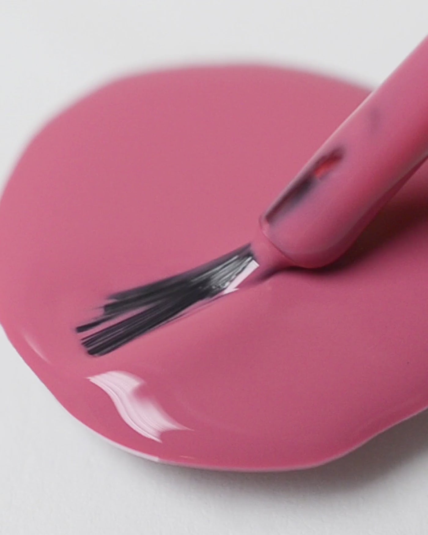 midtone pink nail polish drop by sienna