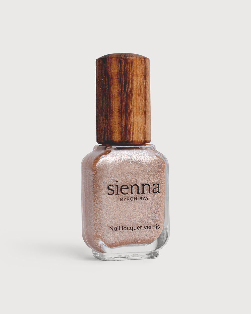 Radiant Rose Peach Crystal nail polish glass bottle with timber cap