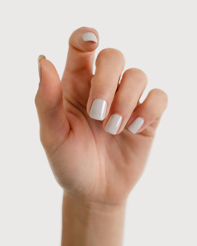 cool grey nail polish hand swatch on fair skin tone