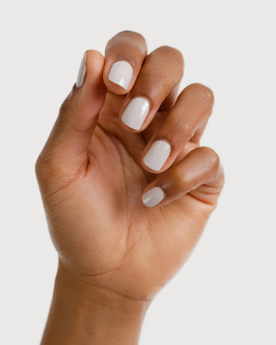 cool grey nail polish hand swatch on medium skin tone 
