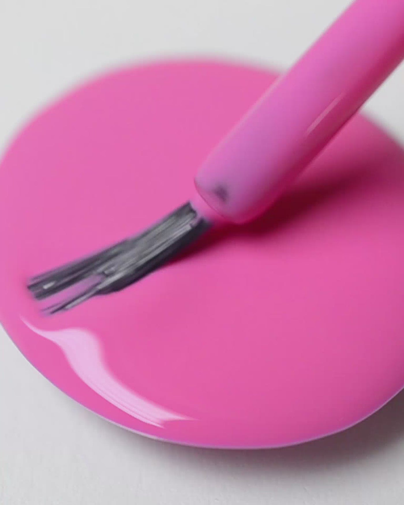 Bright mid-tone fuchsia nail polish drop by sienna