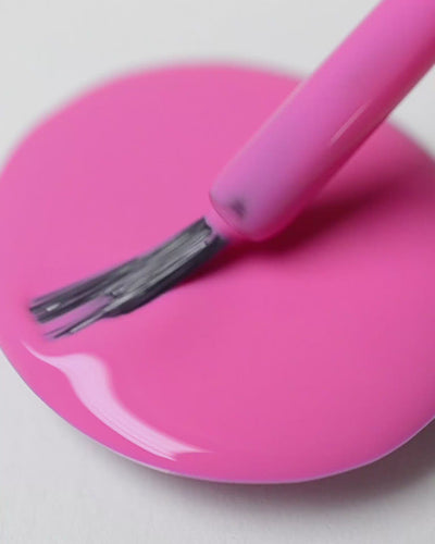 Bright mid-tone fuchsia nail polish drop by sienna