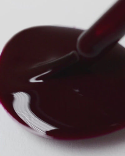 dark red nail polish drop by sienna