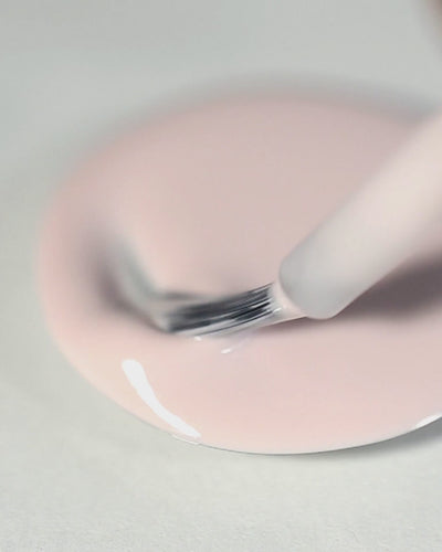 misty lilac nail polish swirl with brush