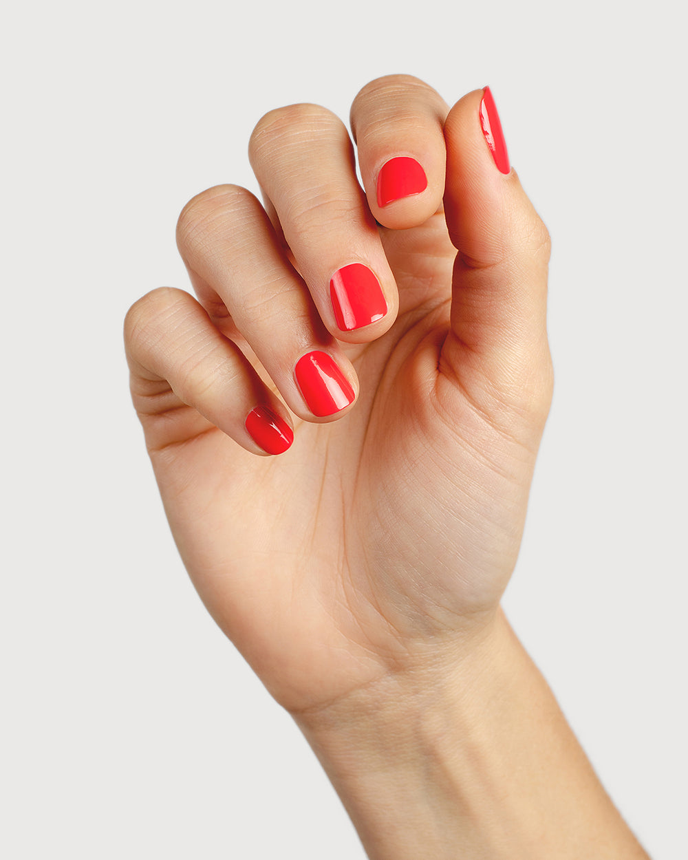 barbie pink nail polish hand swatch on fair skin tone