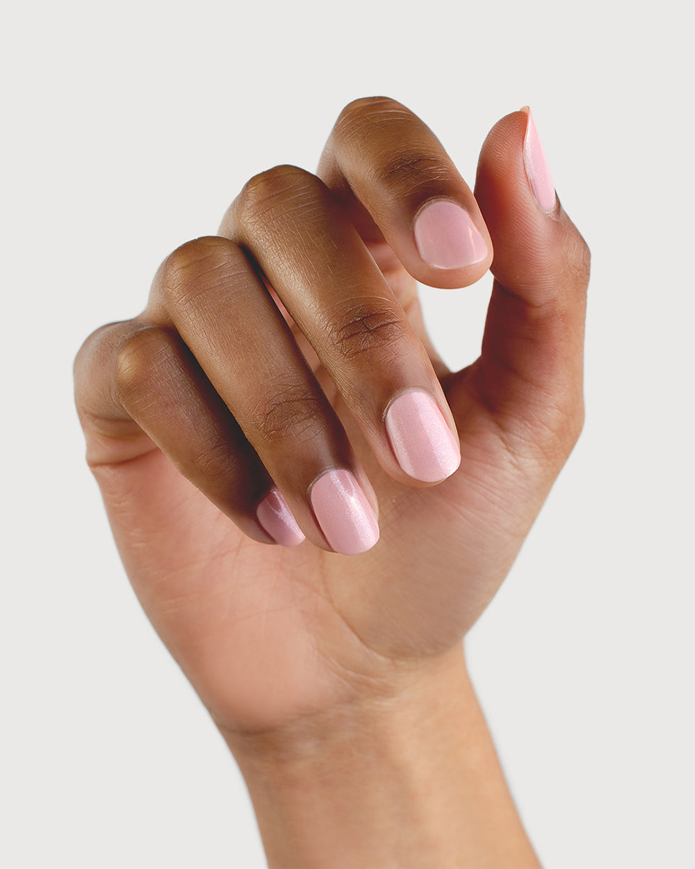 Shimmering Cherry Blossom Nail Polish on Medium Skin Tone