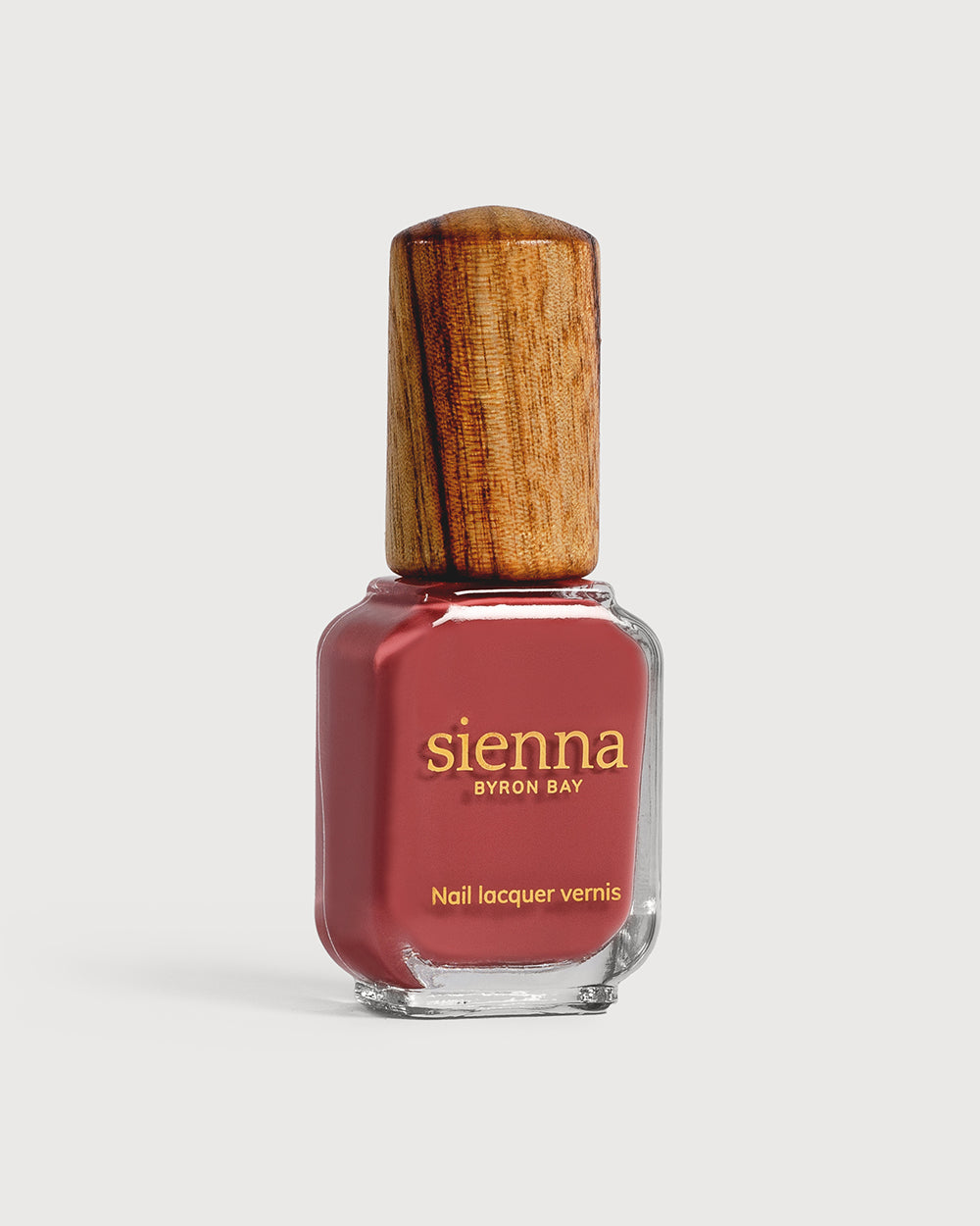 dusty rosebud nail polish glass bottle with timber cap