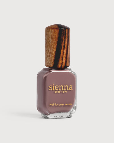 dusty mauve nail polish glass bottle with timber cap