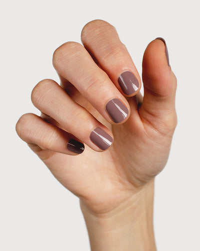 dusty mauve nail polish hand swatch on fair skin tone