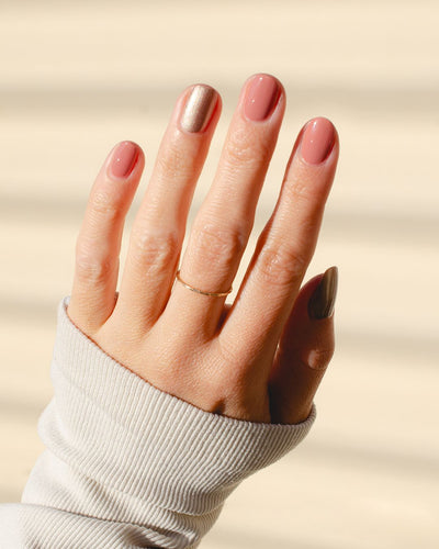 Rose brown with silver satin Glaze and Stony mauve nail polish painted on nails with Fair skin tone